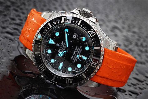 luxury watch with rubber strap.